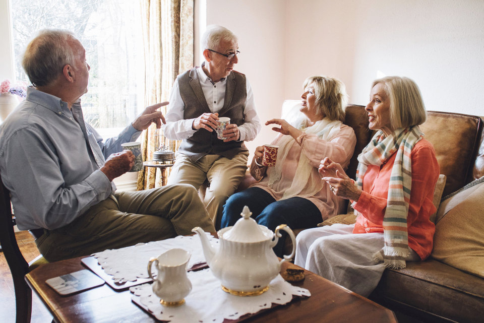 group of seniors having a tea party